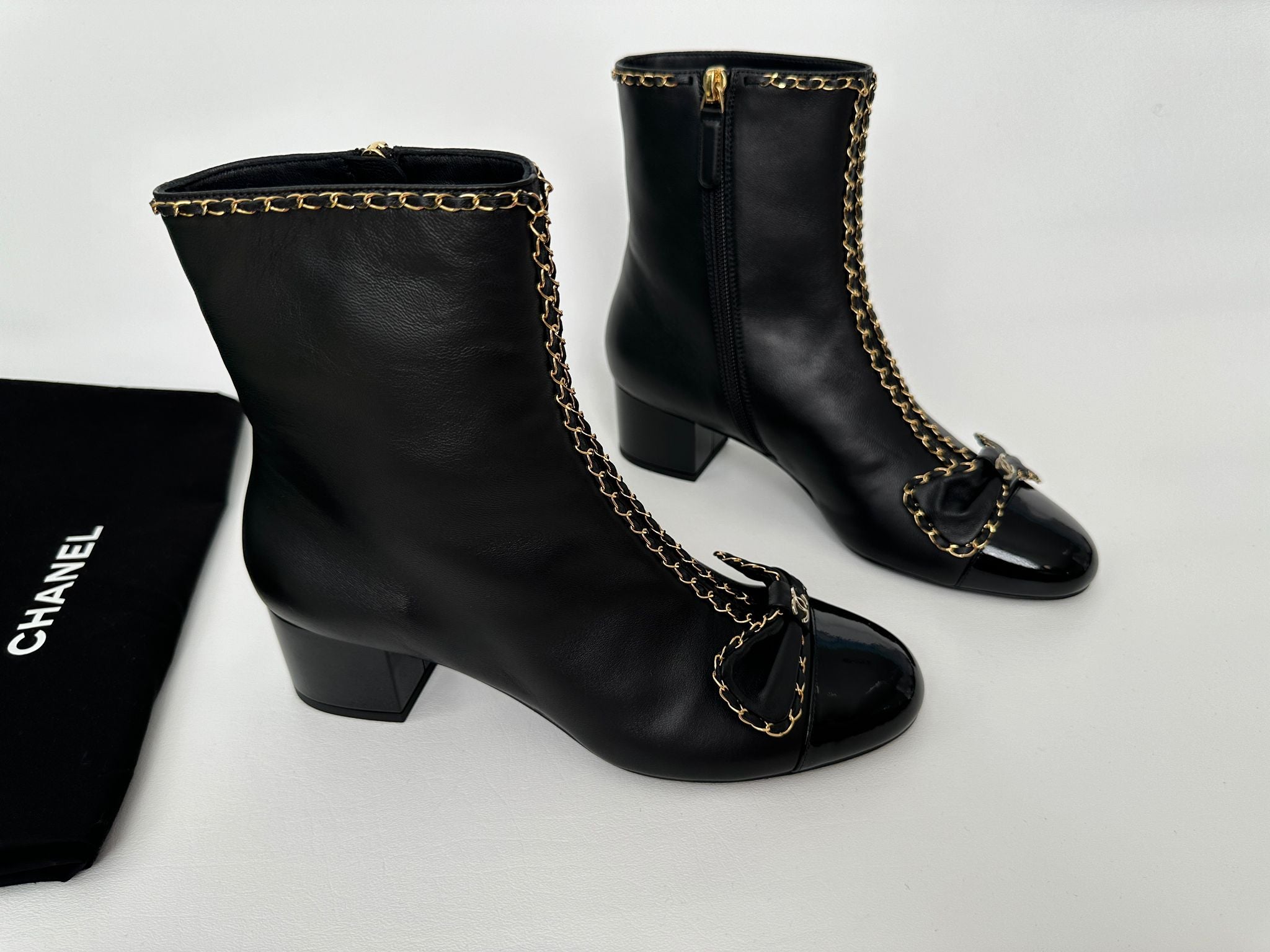 Chanel 24B Black Lambskin Leather Short Booties with Gold Chains and Bow Ankle Short Boots