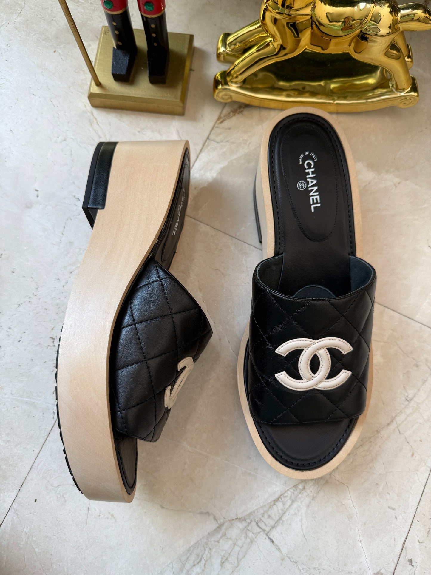 CHANEL BLACK WOODEN MULES IN LAMBSKIN LEATHER WITH CREAM CC LOGO DETAIL WEDGE SLIDES