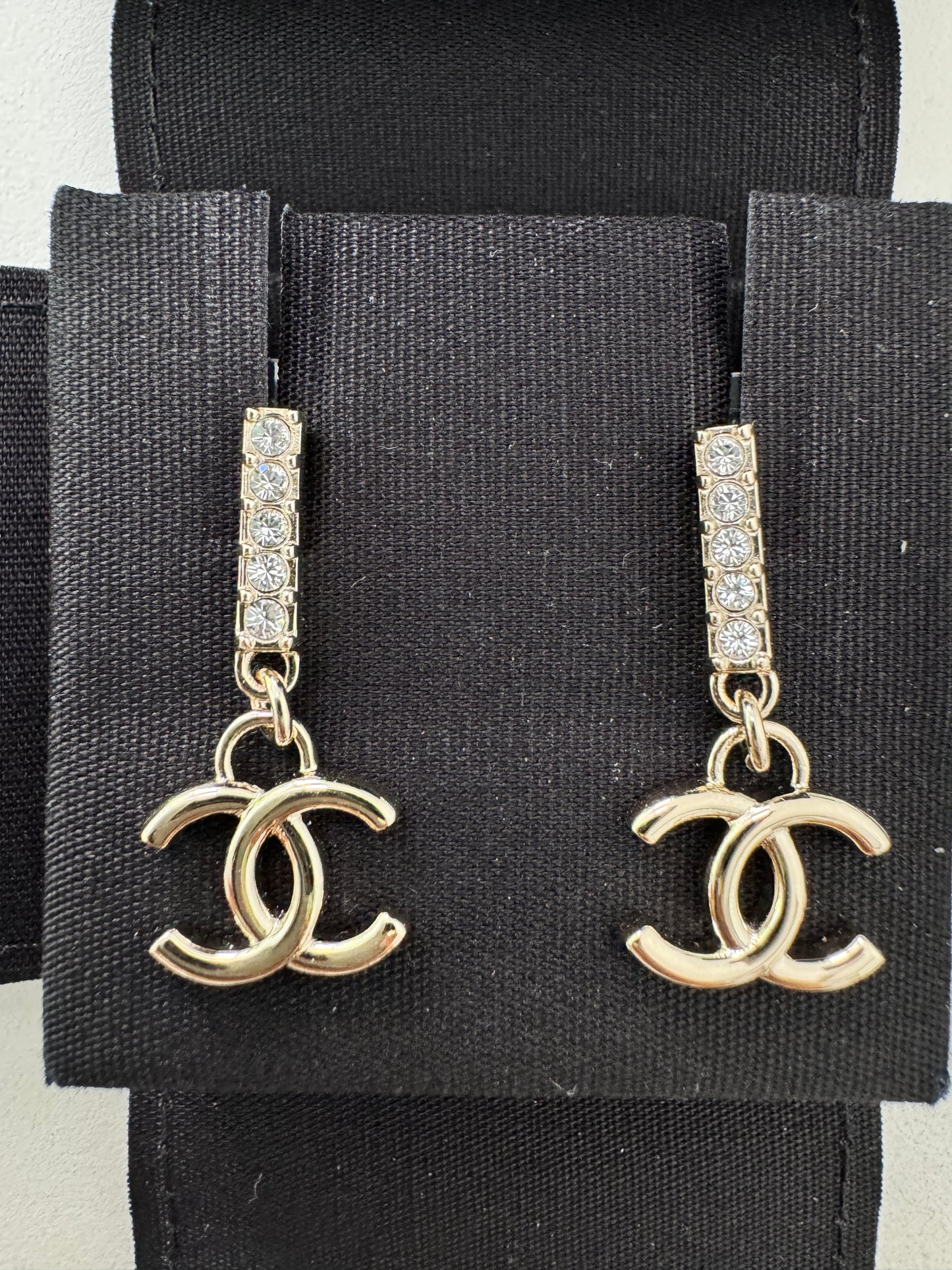 CHANEL 24P GOLD TONE METAL STUDDED CC LOGO WHITE CRYSTALS DANGLE DROP EARRINGS