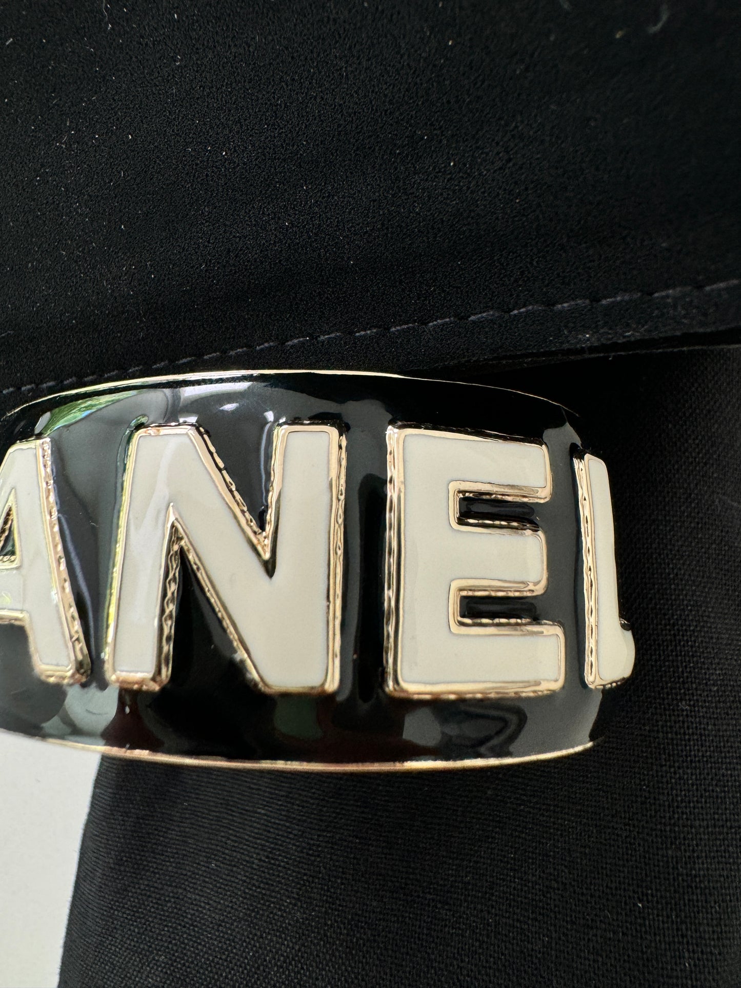 CHANEL 22A ENAMEL BLACK WHITE GOLD  METAL CUFF LOGO LARGE BANGLE BRACELET SMALL