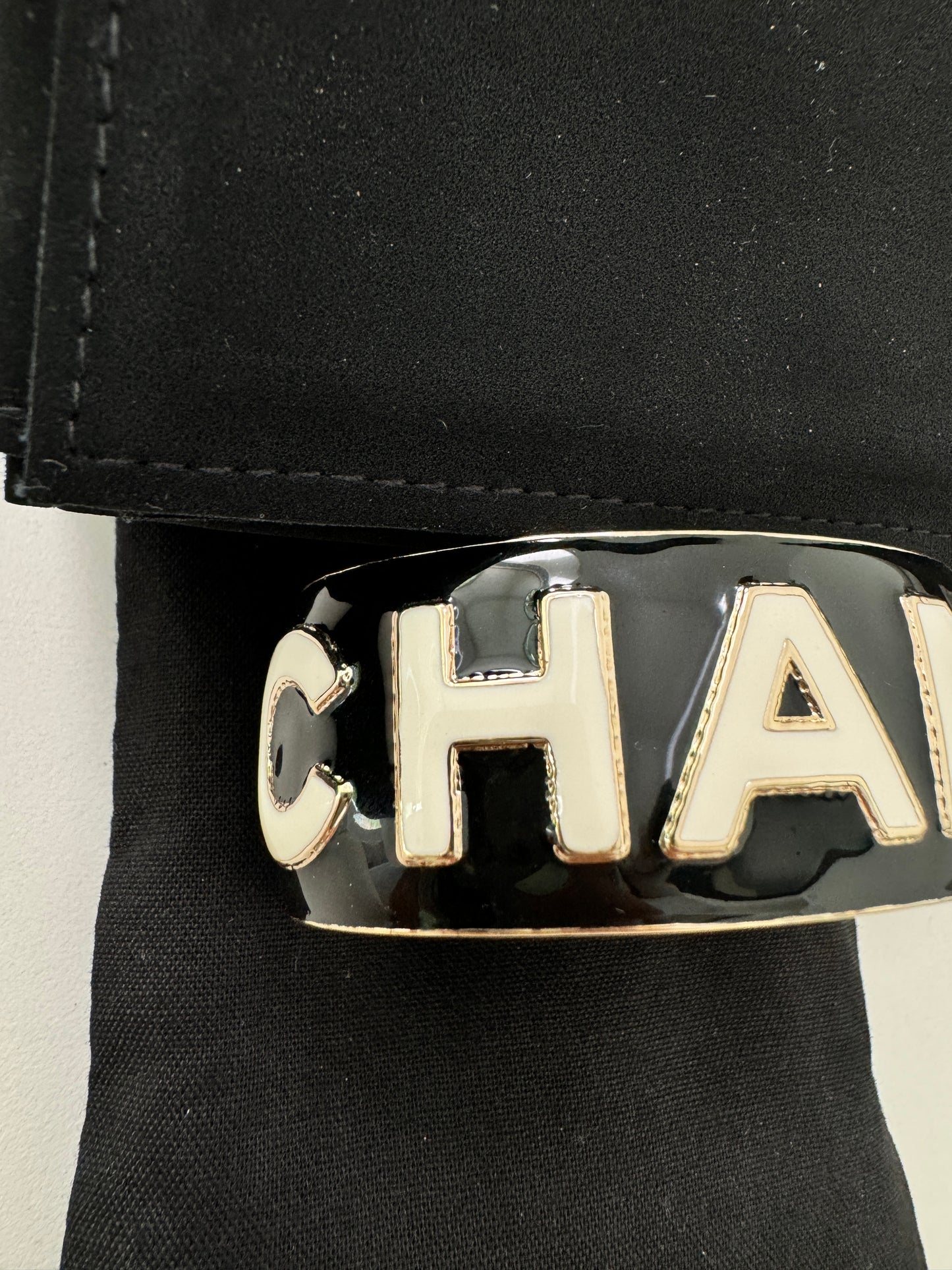 CHANEL 22A ENAMEL BLACK WHITE GOLD  METAL CUFF LOGO LARGE BANGLE BRACELET SMALL