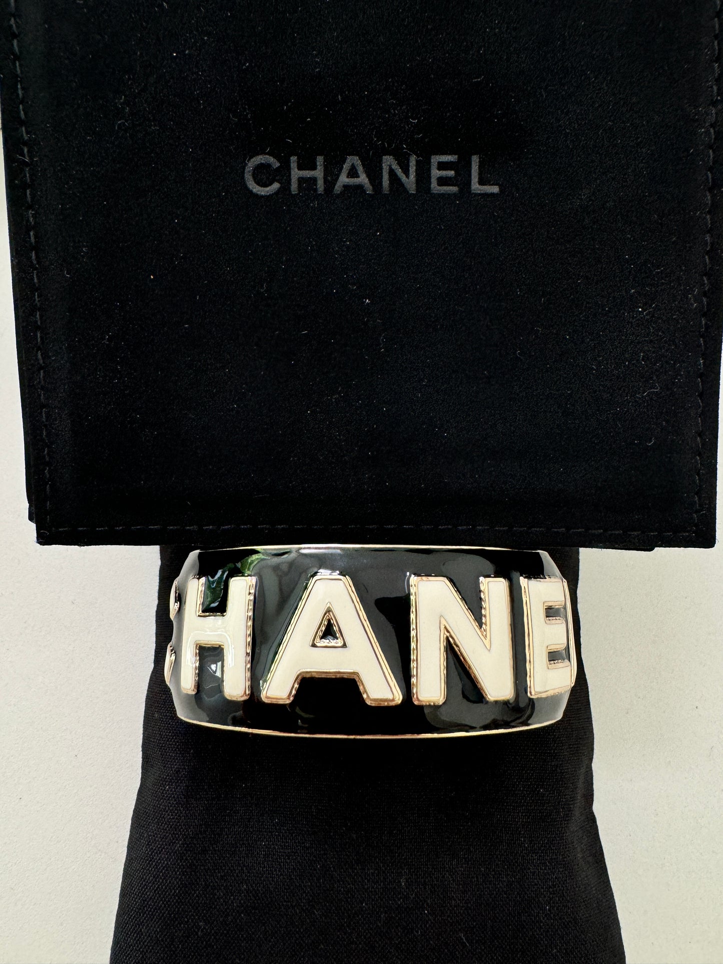 CHANEL 22A ENAMEL BLACK WHITE GOLD  METAL CUFF LOGO LARGE BANGLE BRACELET SMALL