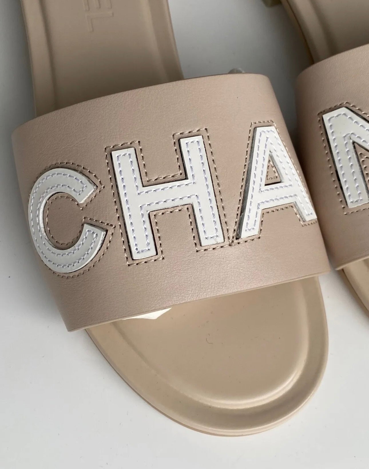 Chanel tan hot sale slides